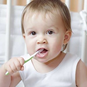 Child brushing teeth