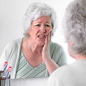 Woman with tooth pain